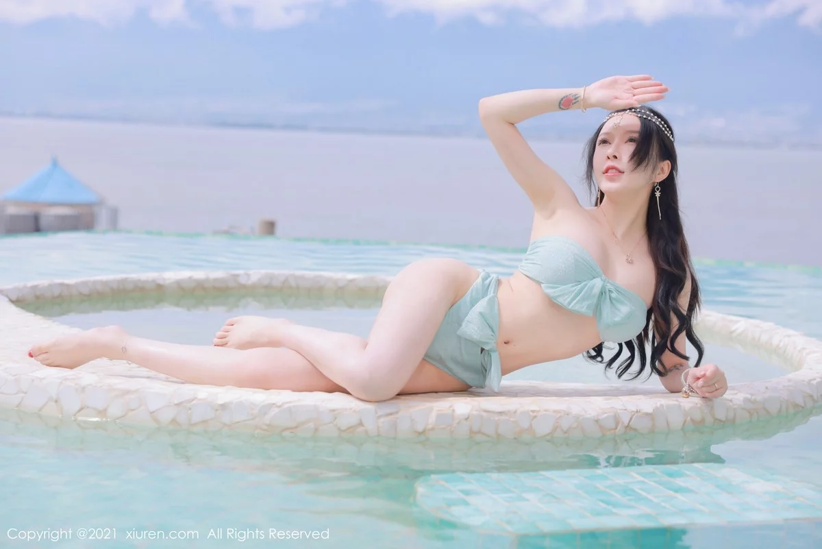 [[XiuRen秀人网]秀人网]No.4248_模特玉兔miki大理旅拍异域风情主题半脱秀完美身材诱惑写真50P