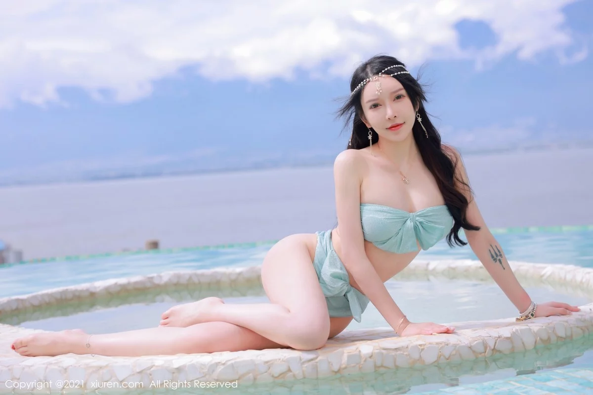 [[XiuRen秀人网]秀人网]No.4248_模特玉兔miki大理旅拍异域风情主题半脱秀完美身材诱惑写真50P