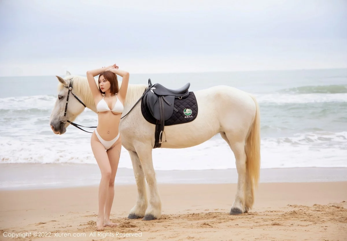[[XiuRen秀人网]秀人网]No.4853_御姐果儿Victoria三亚旅拍沙滩场景白色内衣秀凹凸身材诱惑写真40P