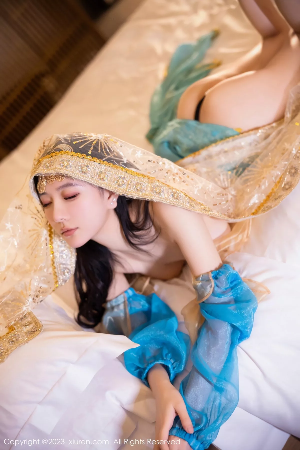 [[XiuRen秀人网]秀人网]No.7469_模特幼幼性感蓝色西域舞娘短裙露黑色内裤秀白嫩美腿诱惑写真82P