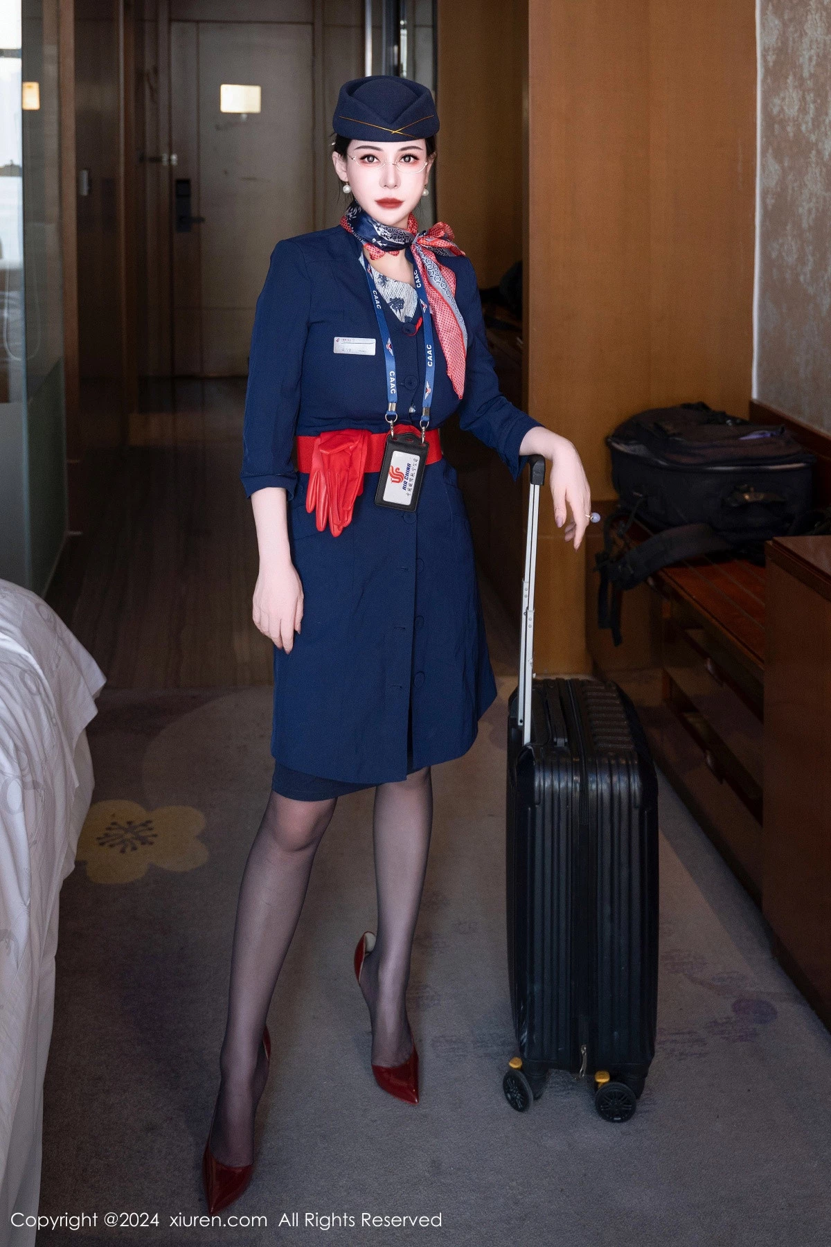 [[XiuRen秀人网]秀人网]No.8253_模特悦悦姐性感空姐制服露红色内衣配黑丝袜秀魔鬼身材诱惑写真75P