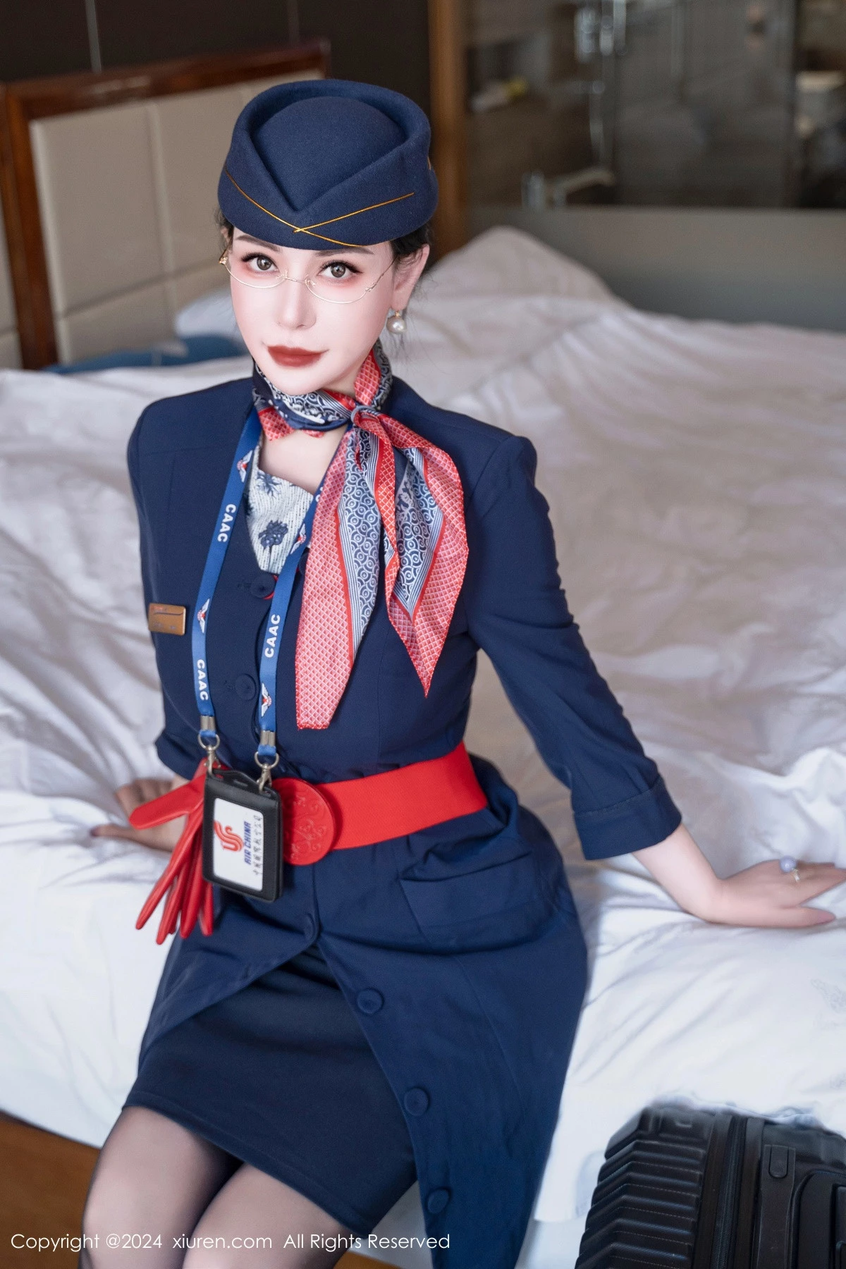 [[XiuRen秀人网]秀人网]No.8253_模特悦悦姐性感空姐制服露红色内衣配黑丝袜秀魔鬼身材诱惑写真75P