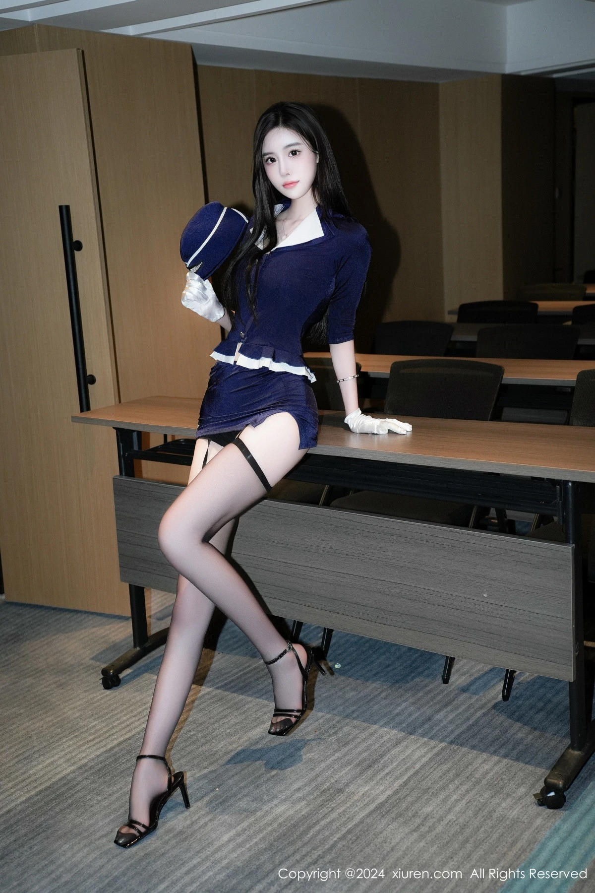 [[XiuRen秀人网]秀人网]No.9126_模特Erikaki性感蓝色空姐制服配黑丝吊袜秀修长美腿撩人诱惑写真80P