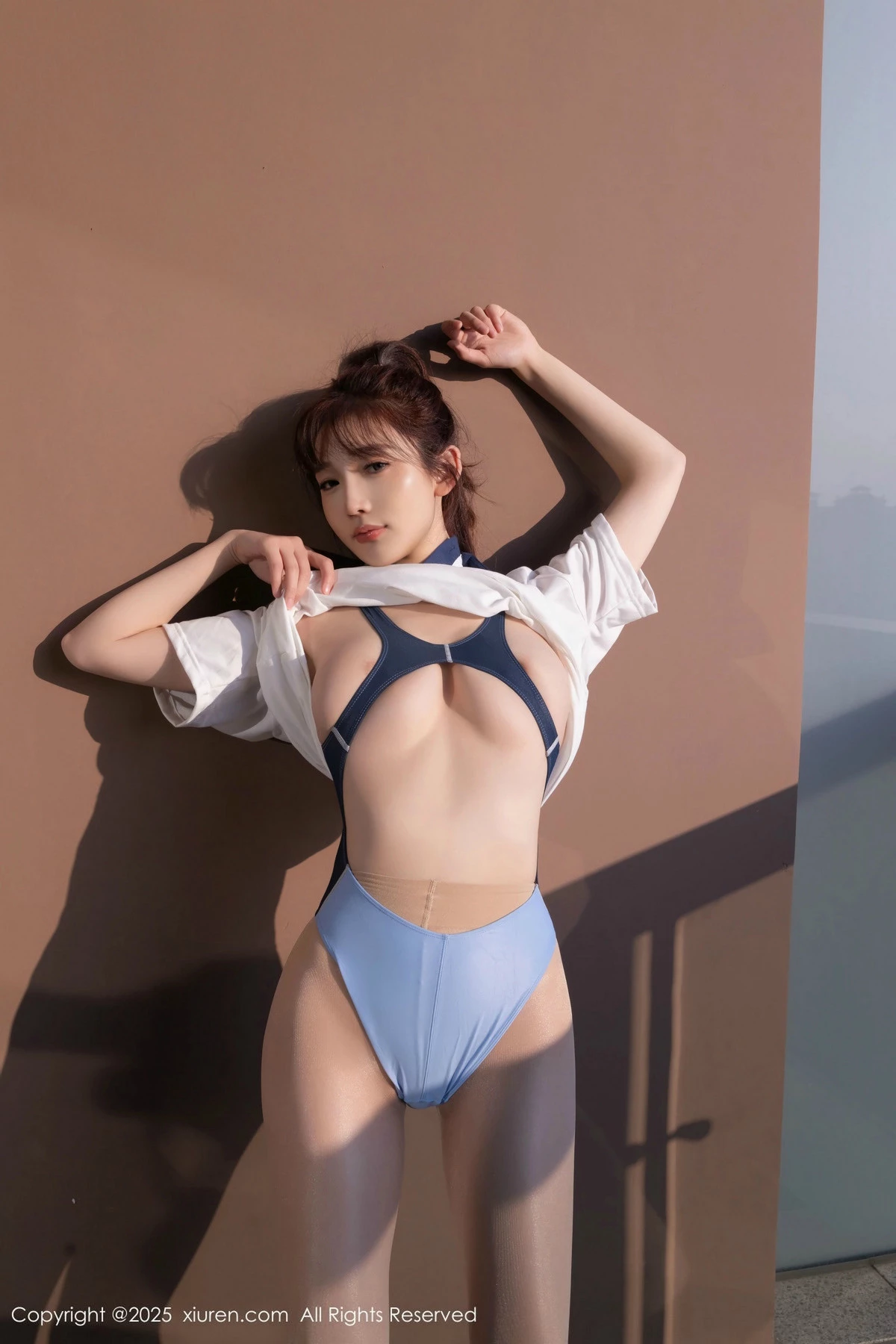 [[XiuRen秀人网]秀人网]No.9979_模特陆萱萱性感蓝白色学生运动装配超薄肉丝秀柔美身姿诱惑写真84P